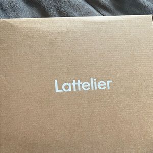 New in box Lattelier brand black high boot. Faux leather. Size 9